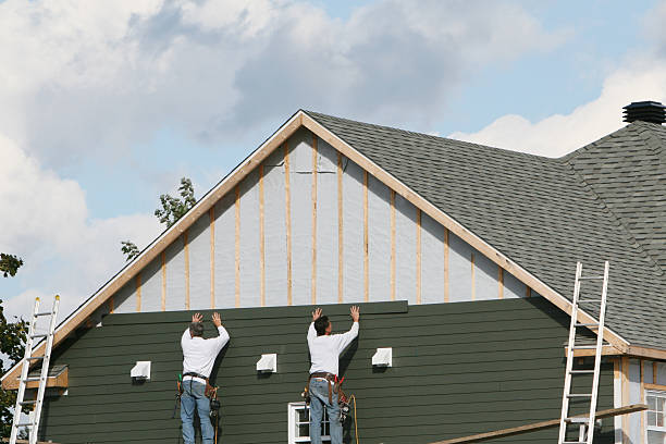 Professional Siding technician working in Riverside, PA